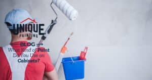 man-holding-painting-materials-with-a-caption-What-Kind-of-Paint-Do-You-Use-on-Cabinets-