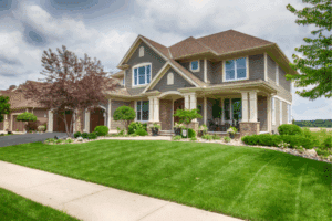 Professional landscaping services with manicured lawn and curb appeal design for residential home.