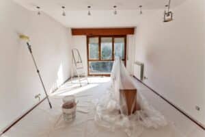 a room painted white with a paint roller.j